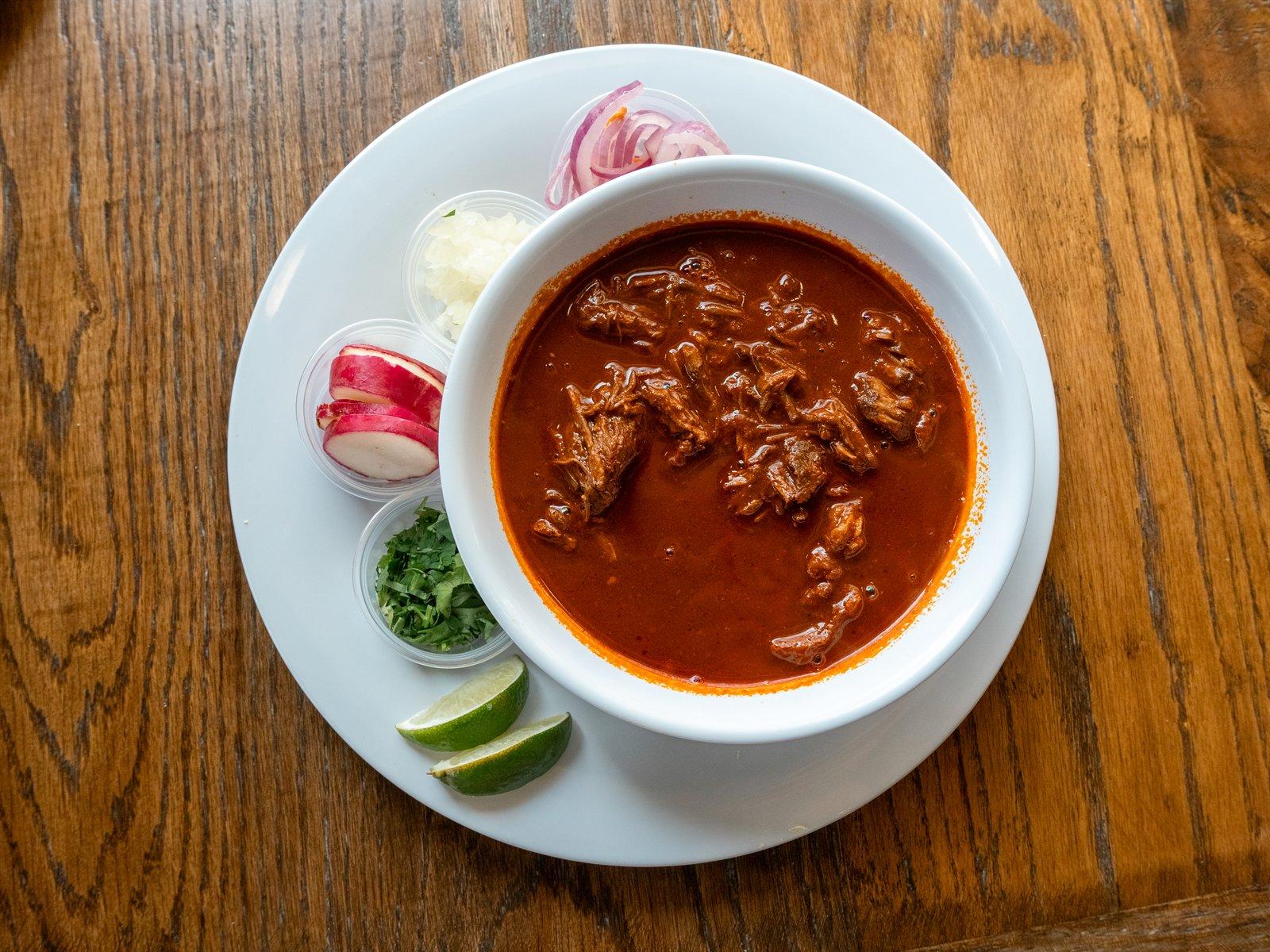 Birria consommé bowl loaded with beef